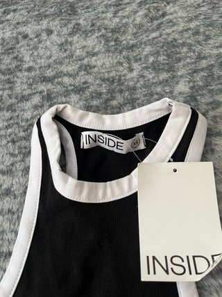 Top negro Inside con ribete blanco Talla XS