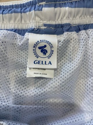 Costume a righe blu e bianche