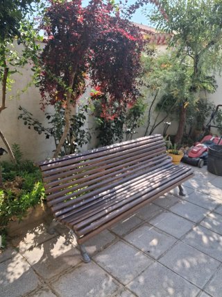 Banco de madera y forja