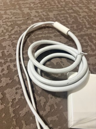 Adaptador de corriente Apple