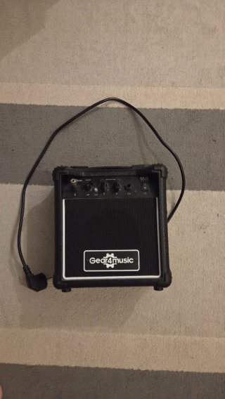 Guitarra Eléctrica Negra para zurdos + Amplificado