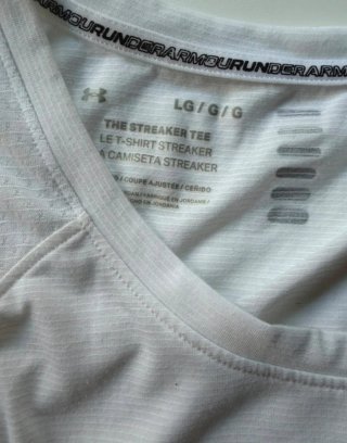 Camiseta tirantes Under Armour blanca