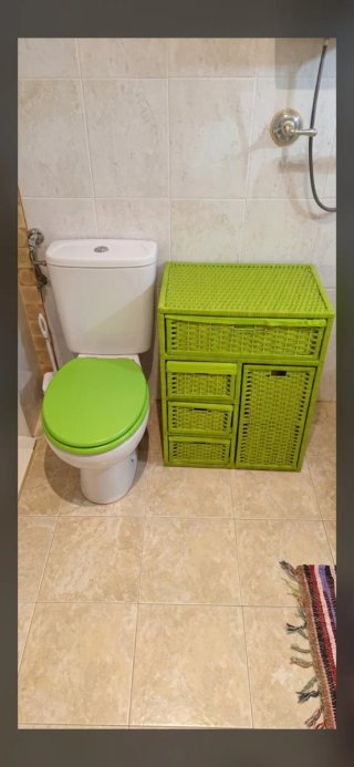 Conjunto de baño verde y blanco