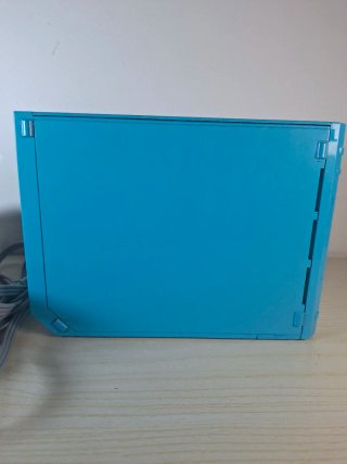 Console nintendo wii azzurra con cavi e sensore