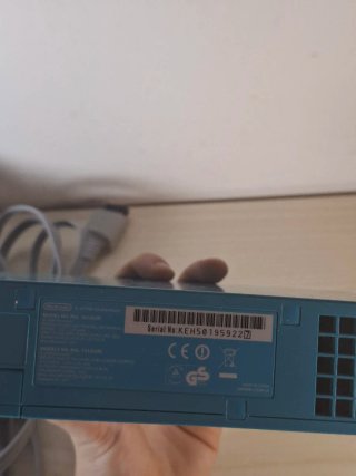 Console nintendo wii azzurra con cavi e sensore