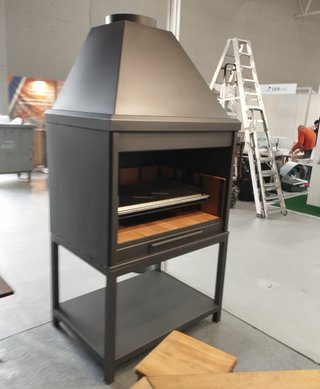 Barbacoa de obra con parrilla y horno
