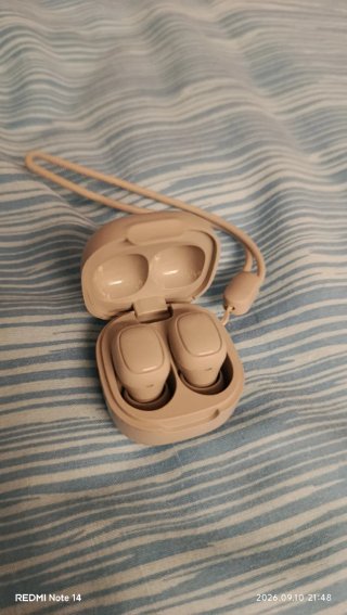 Auriculares inalámbricos beige alta gama