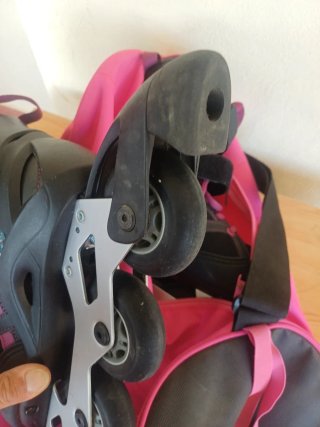 Patines línea Oxelo ajustables T37-40, bolsa rosa