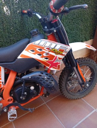 Moto infantil cross naranja y blanca