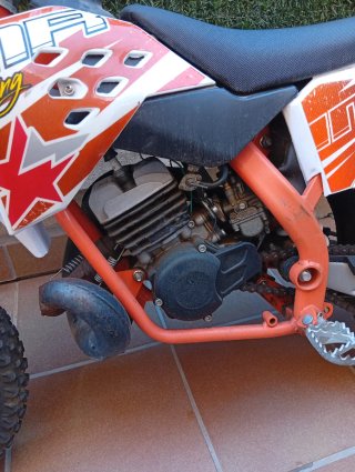Moto infantil cross naranja y blanca
