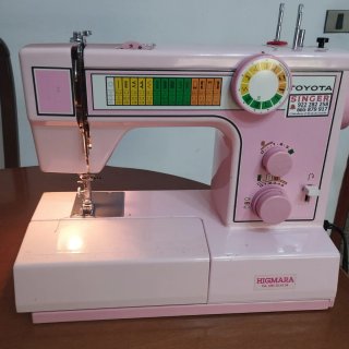 Máquina de coser Singer Toyota.