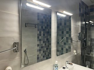 Espejos de baño con apliques de luz