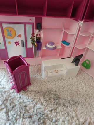 Maletín de playmobil tienda de ropa