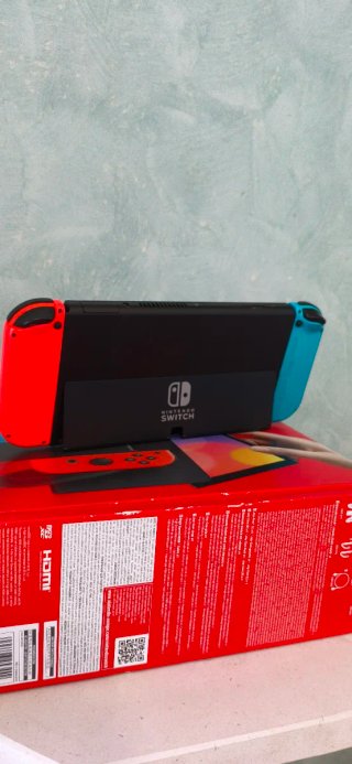 Nintendo Switch OLED Azul y Naranja