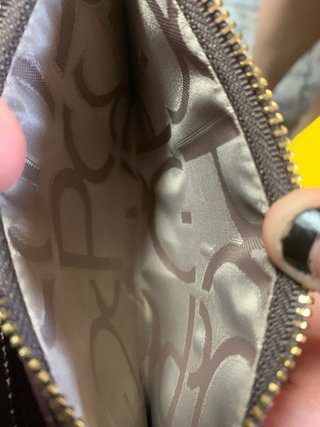 Cartera Purificación García monograma marrón coral