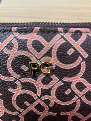 Cartera Purificación García monograma marrón coral