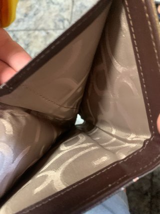 Cartera Purificación García monograma marrón coral