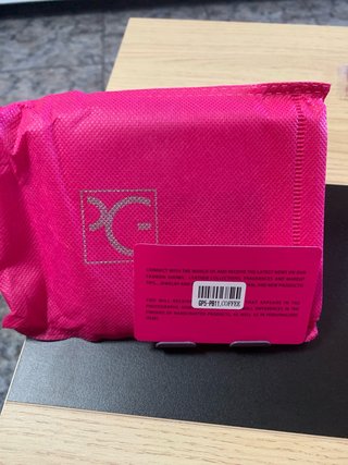 Cartera Purificación García monograma marrón coral