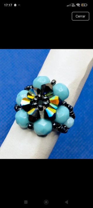 Anillo flor turquesa y multicolor