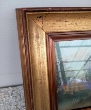 Quadro vintage con cornice dorata