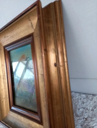 Quadro vintage con cornice dorata
