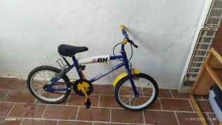 Bicicleta BH infantil azul y amarilla