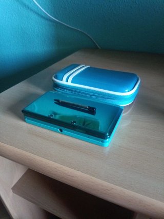 Nintendo 3DS Aqua Blue con funda, cargador y caja