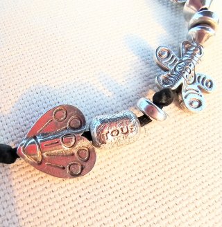 Pulsera Tous Plata y Cordón