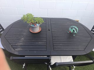 Mesa de jardín negra con 4 sillas