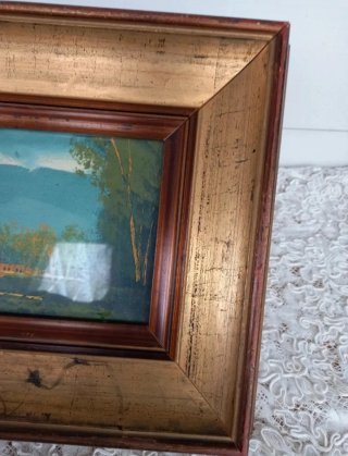 Quadro vintage con cornice dorata
