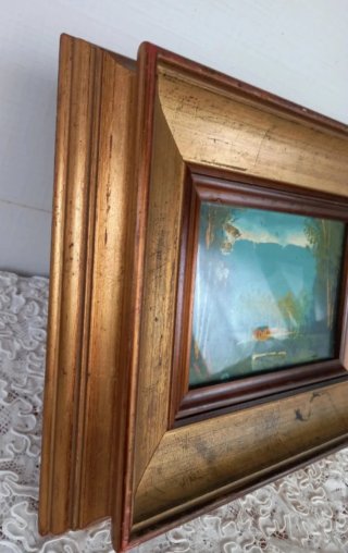 Quadro vintage con cornice dorata
