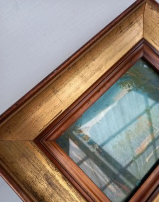 Quadro vintage con cornice dorata