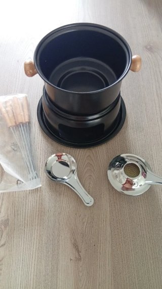 Set de fondue negro y plateado