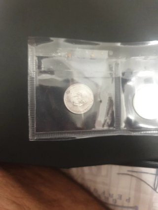 Tira de monedas antiguas variadas