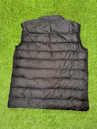 Chaleco acolchado Moncler negro plumas