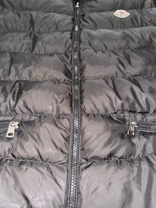 Chaleco acolchado Moncler negro plumas