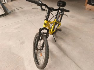 Bicicleta de montaña amarilla Coluer