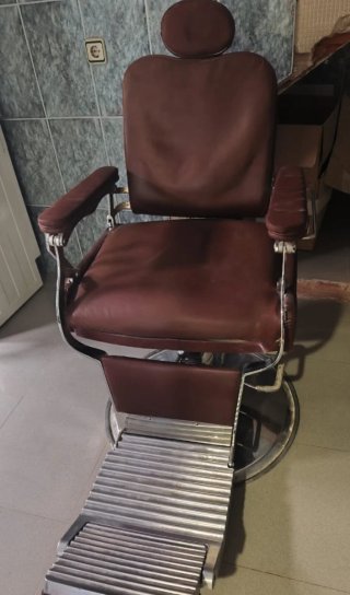 Silla de barbero giratoria de cuero