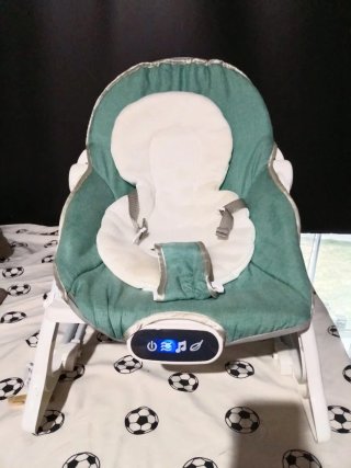 Mecedora de bebé con música