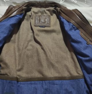 Cazadora de cuero marrón.Marca Massimo Dutti