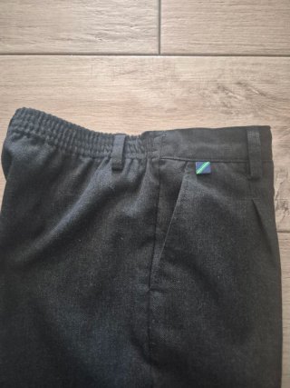 Pantalón corto gris uniforme colegio
