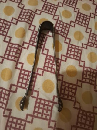 Pinza  antigua