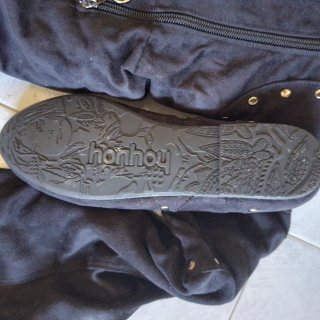 Botas altas negras con tachuelas