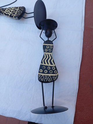 Coppia di candelabri antichi in metallo