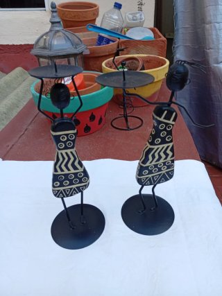 Coppia di candelabri antichi in metallo