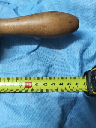 Antiguo mortero de madera con mango