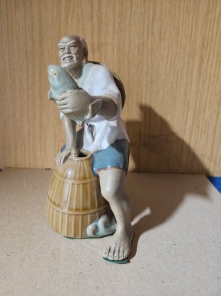 Figura de porcelana china pescador