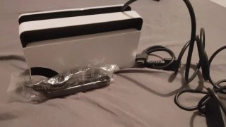 Nintendo Switch OLED + 4 giochi + custodia