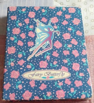 Raccoglitore Fairy Butterfly con rose