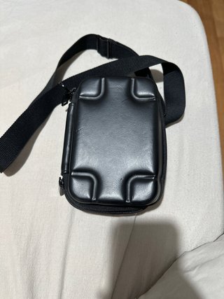 Bolso/Funda de Zara.